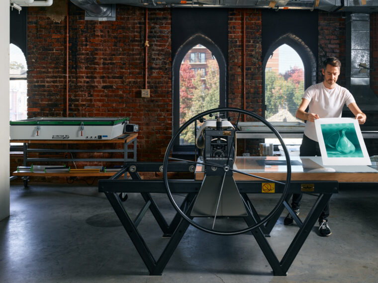 Artist-in-Residence and print maker Myles Calvert at work in his personal studio @ McColl Center,
2022