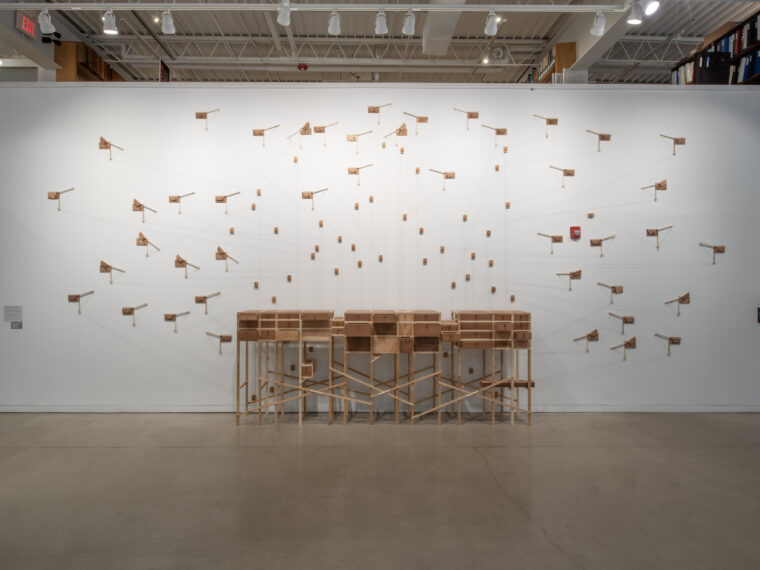Katie Hudnall, The Cabinet of Lost and Found Things, 2024, installation view. Reclaimed wood, string, springs, fasteners, various hardware, found objects, shellac, 42 x 132 x 30 in.