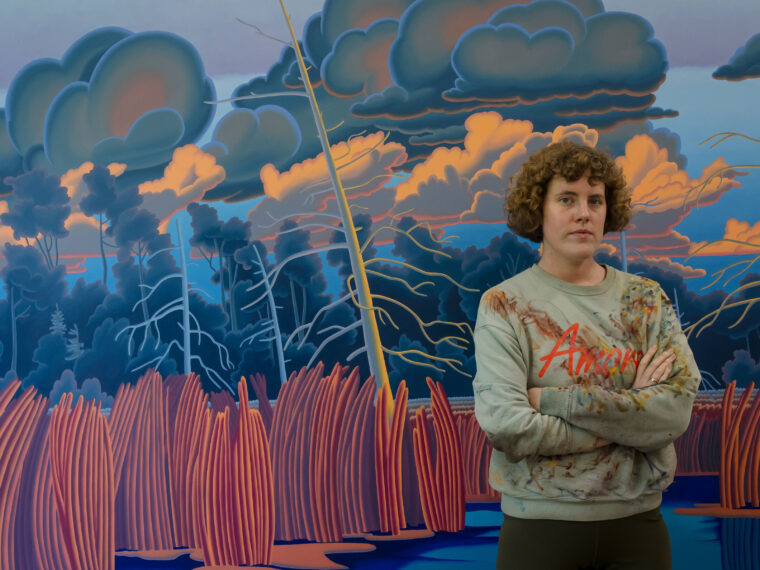 Madeleine Bialke standing in her studio, NAC artist-in-residence, June 2024. Art work details: Madeleine Bialke, The Other Side, 2024, Oil on canvas, 76 x 90 inches. Photograph by Jeremy Simonson.